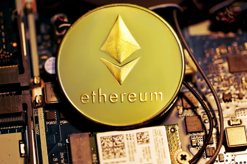 Golden Ethereum coin on computer motherboard symbolizing cryptocurrency growth and blockchain technology in 2025.